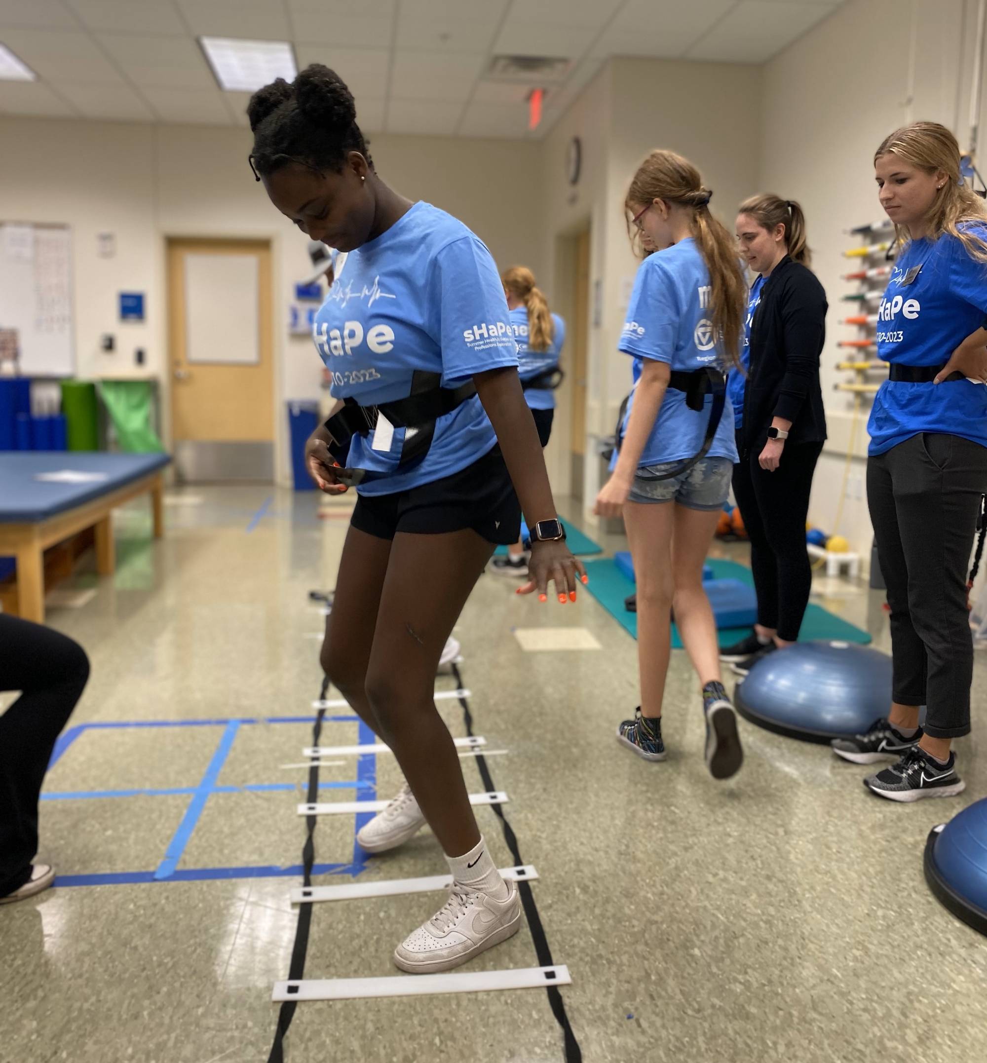 sHaPe camper using agility ladder